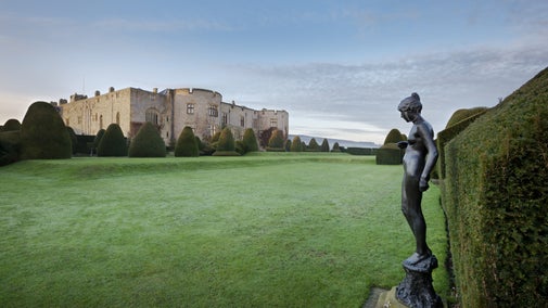 A view across the garden towards the castle at Chirk Castle in Wrexham